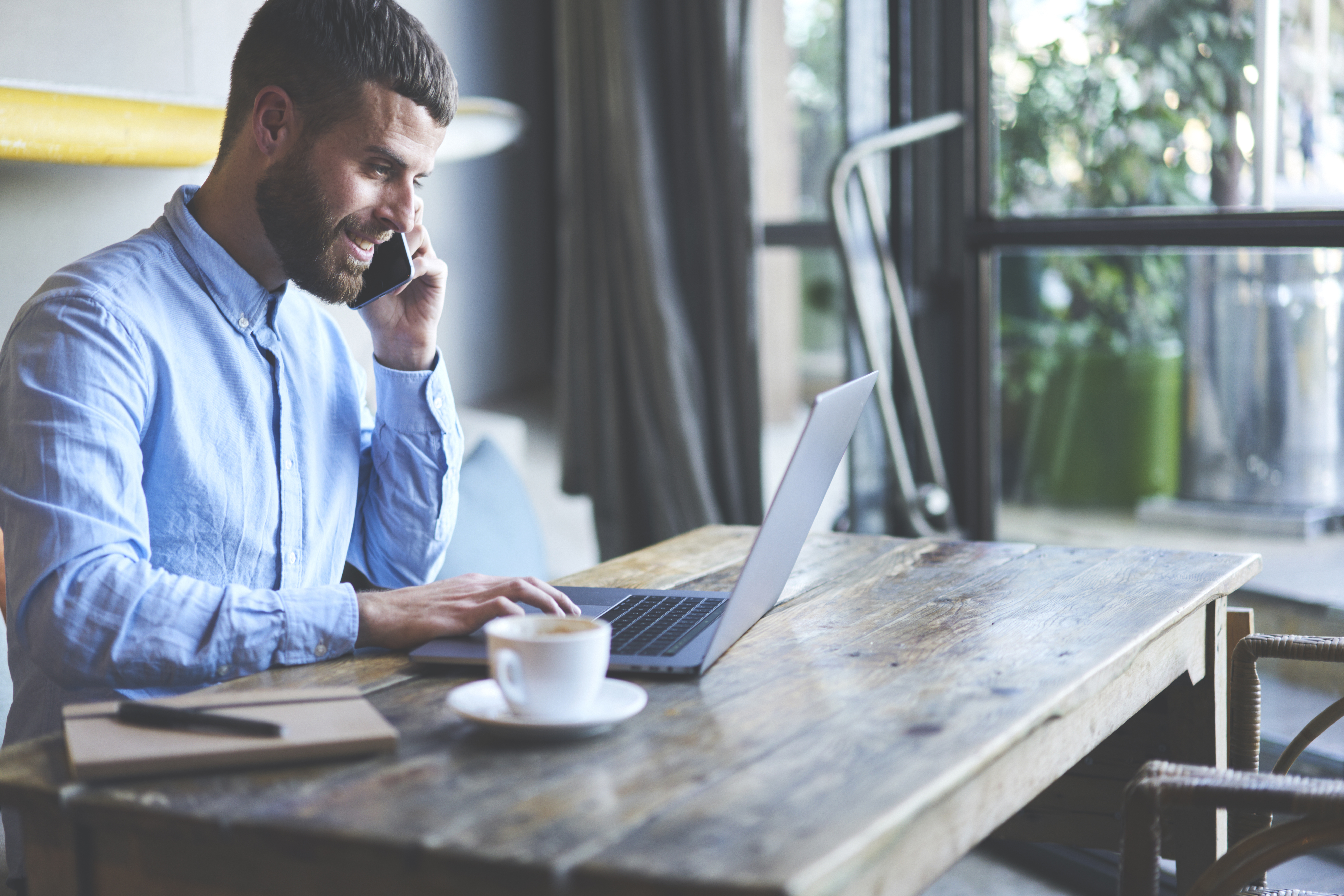 successful owner of a business company talking to invest