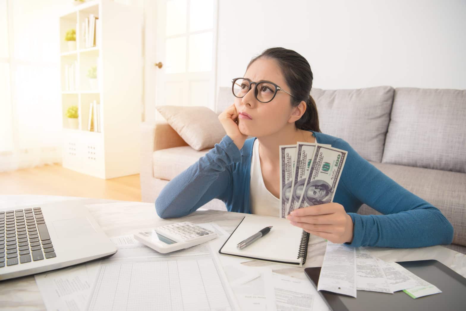woman worried, working on inflation