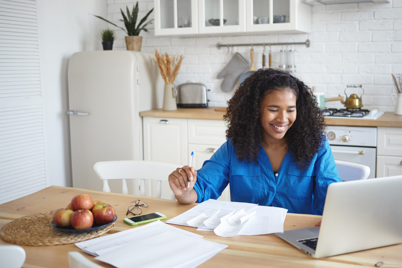 female sitting at the dining table learning health savings accounts