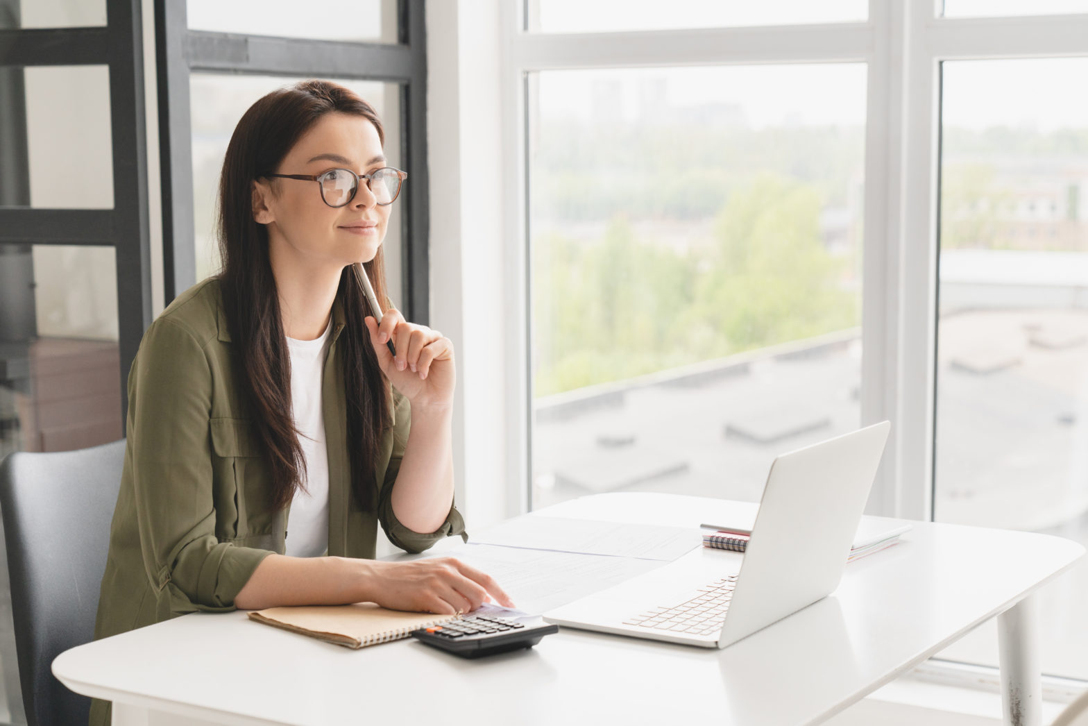 woman planning for future counting cds