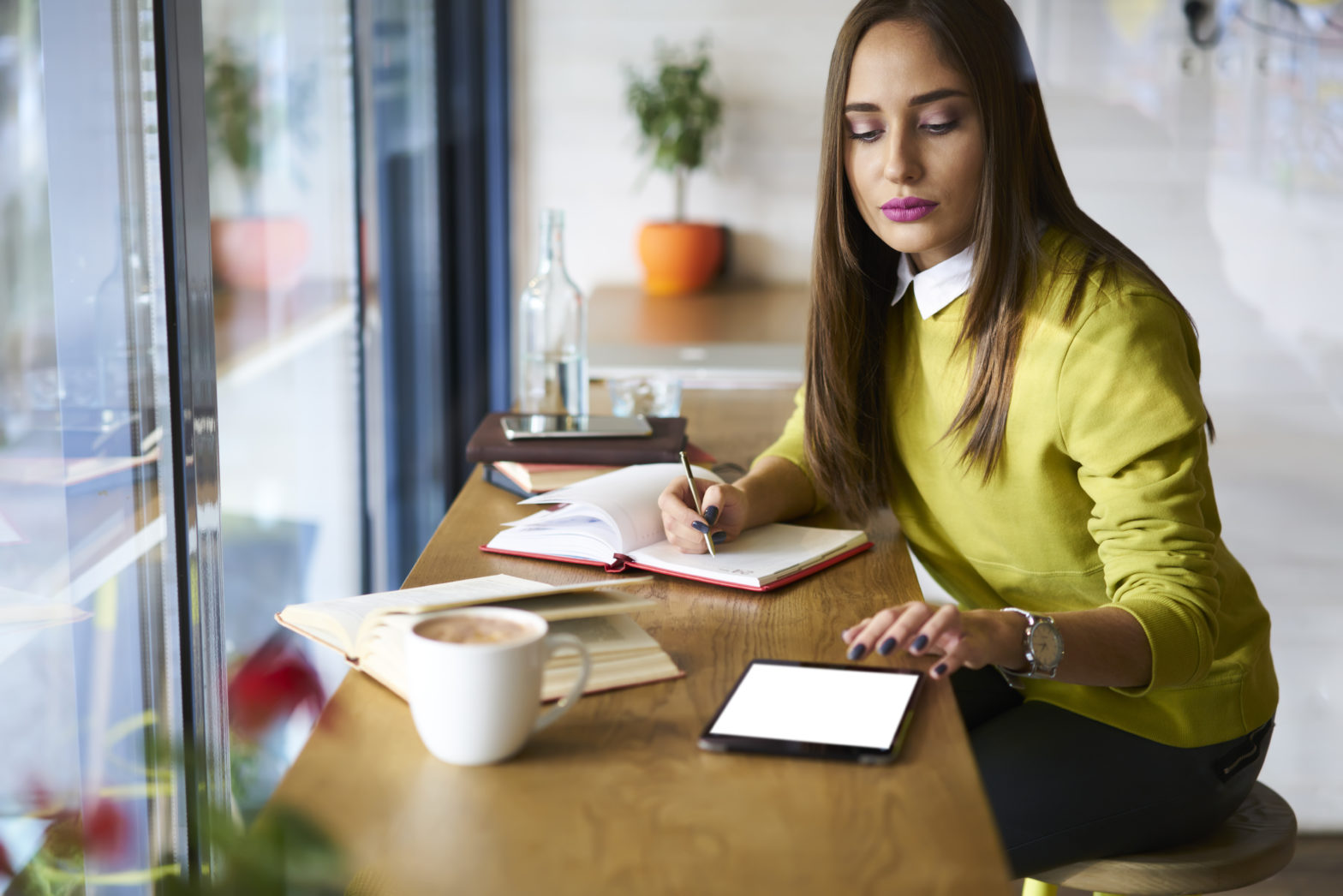 young attractive woman working on checking account