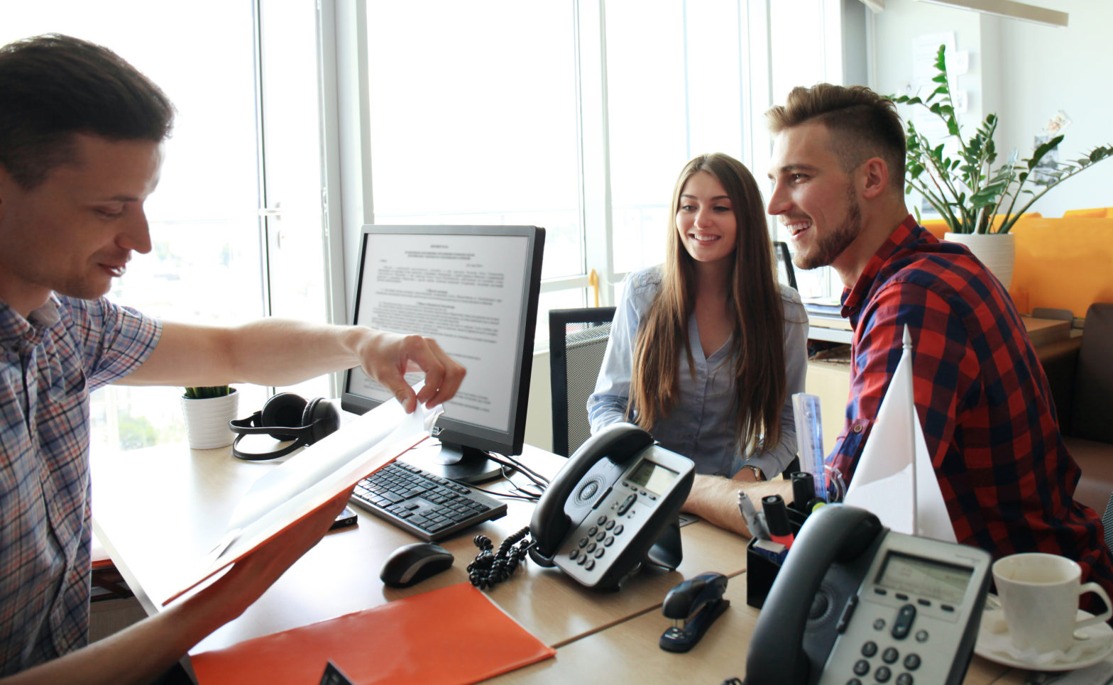 young couple having consultation with the agent