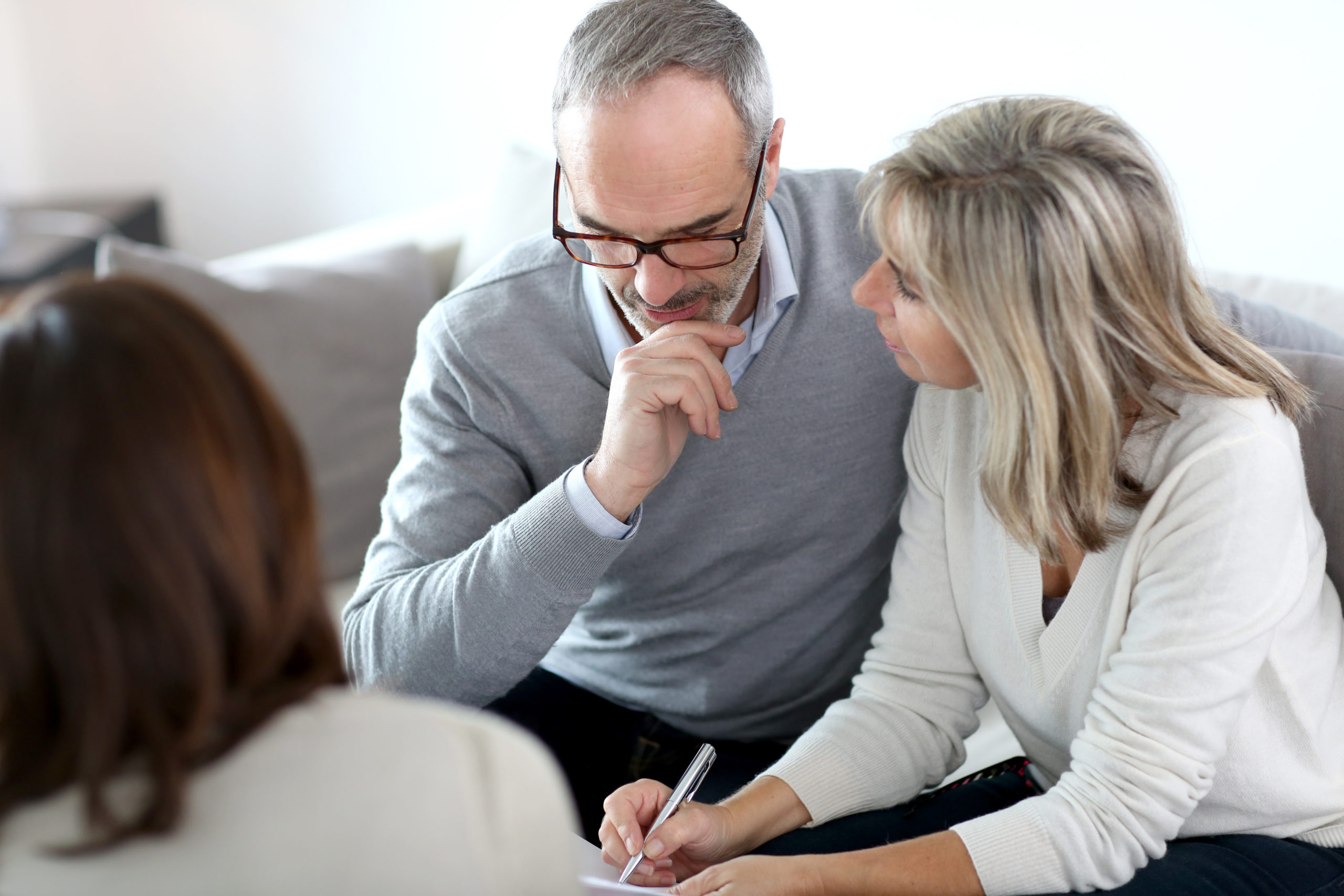 senior couple meeting financial adviser for investment