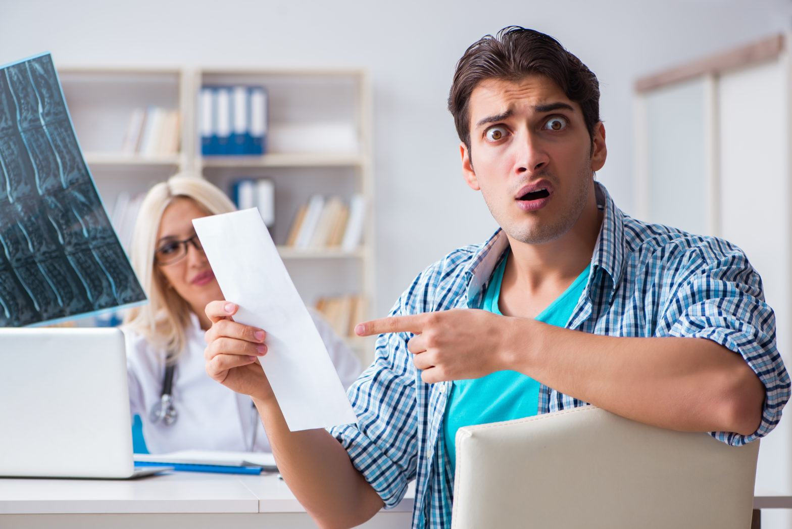 male patient angry at expensive healthcare bill