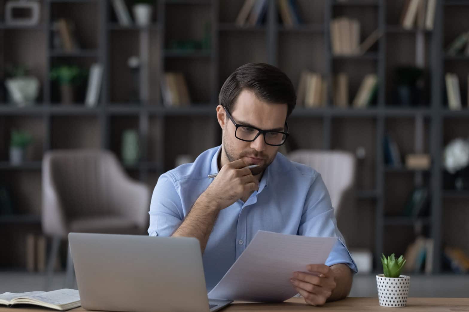 millennial male working to avoid refund anticipation loans