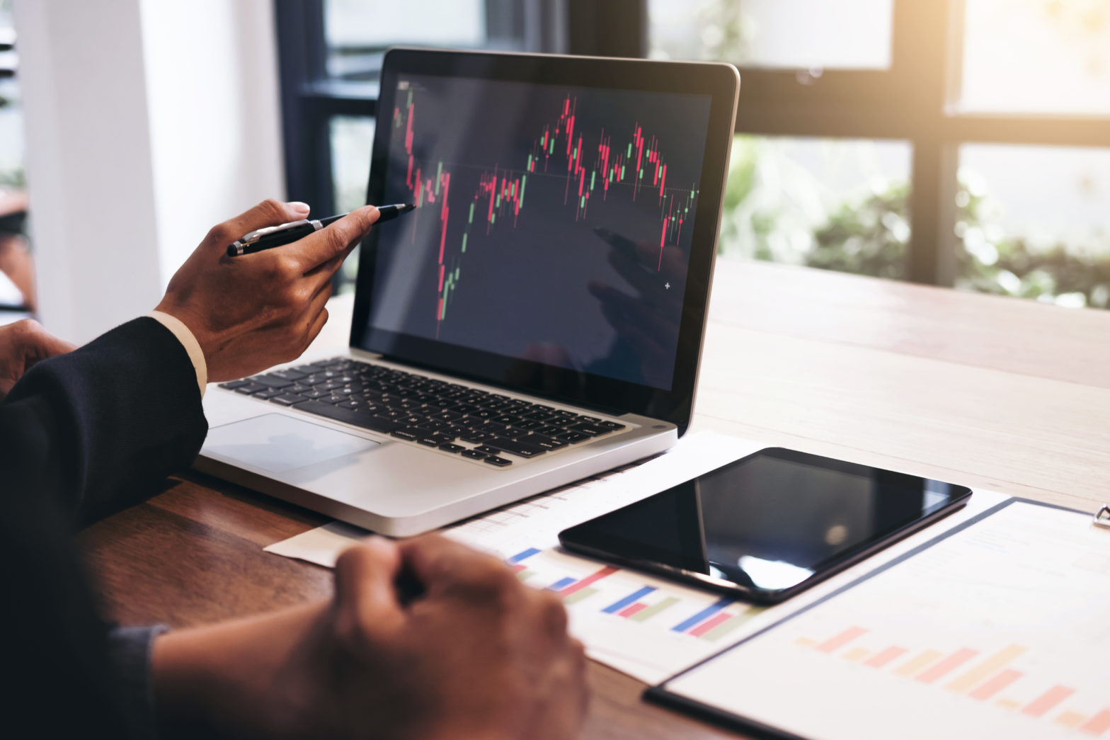 investor working with computer checking stock market