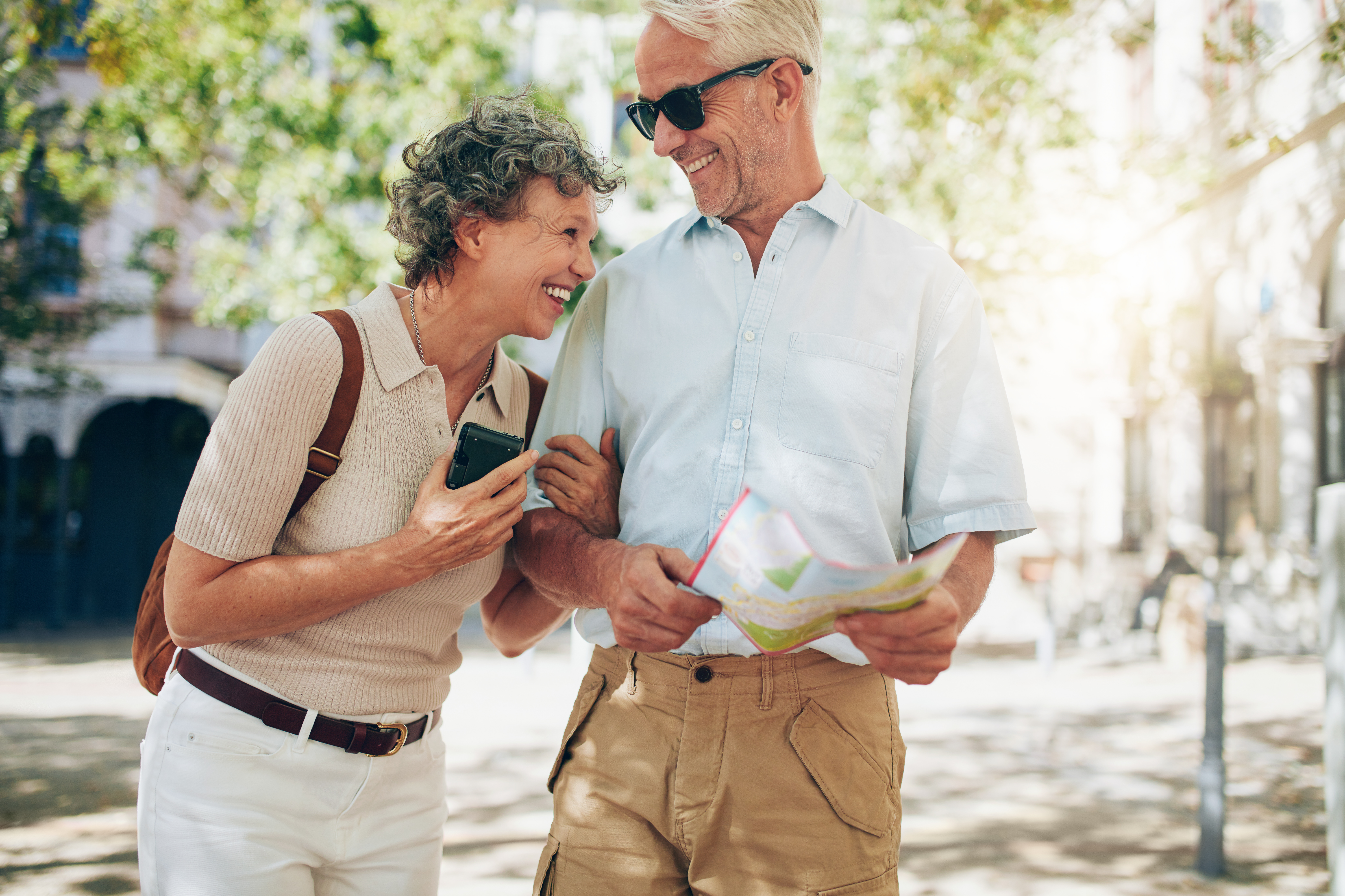 retired couple walking around the town