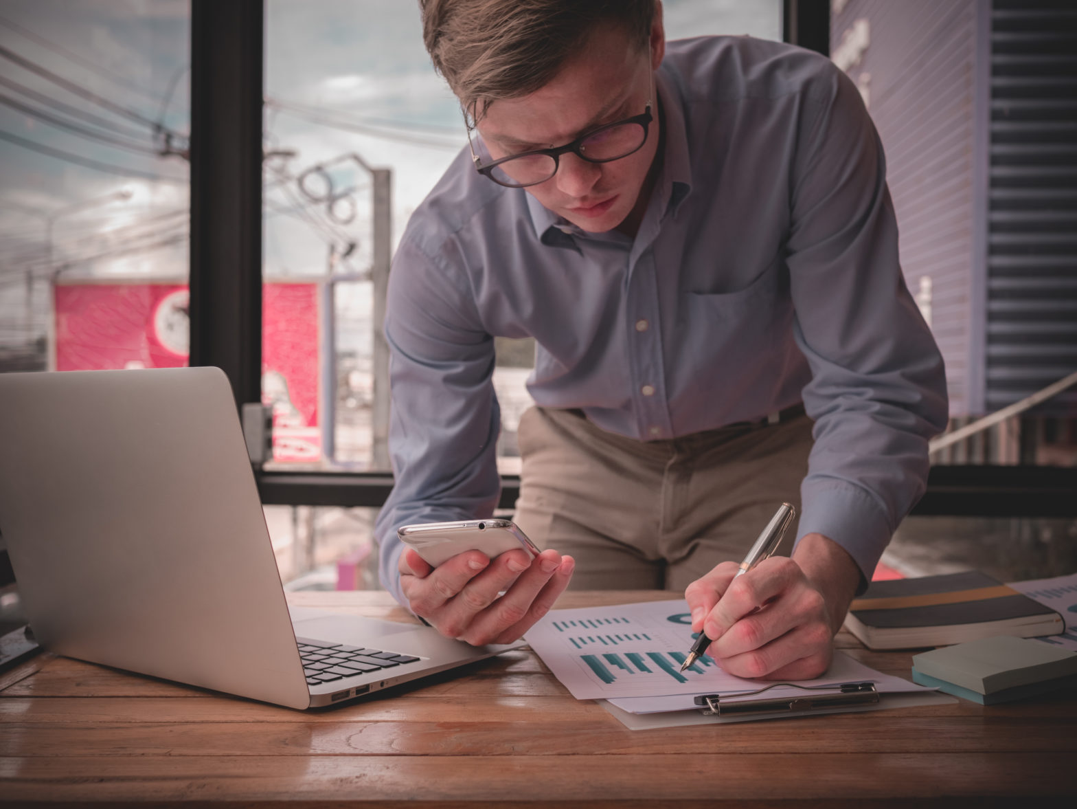 man working on rebalancing an investment portfolio