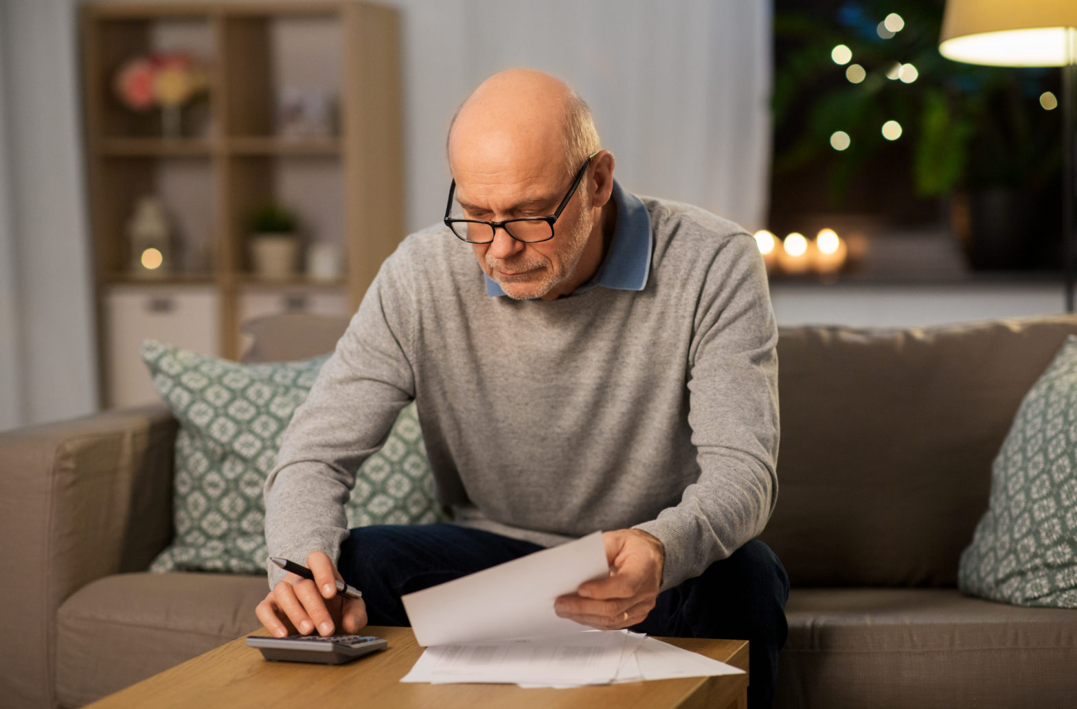 senior man working on savings, annuity and insurance