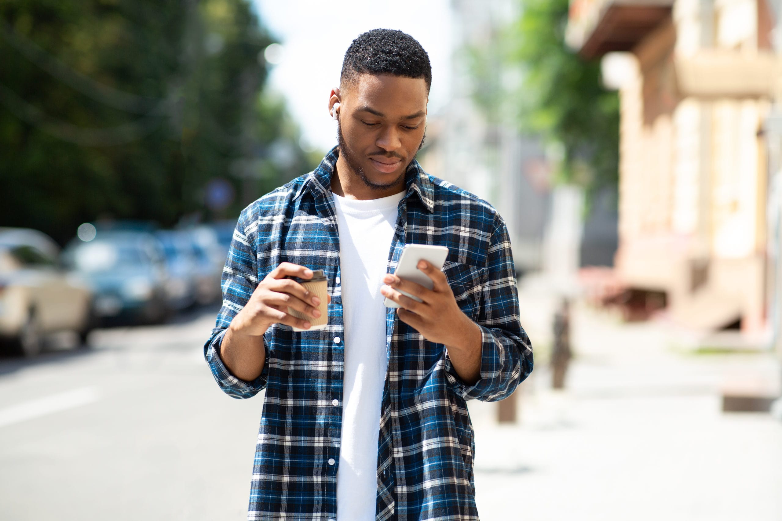 Man using a mobile phone to get a personal loan through app