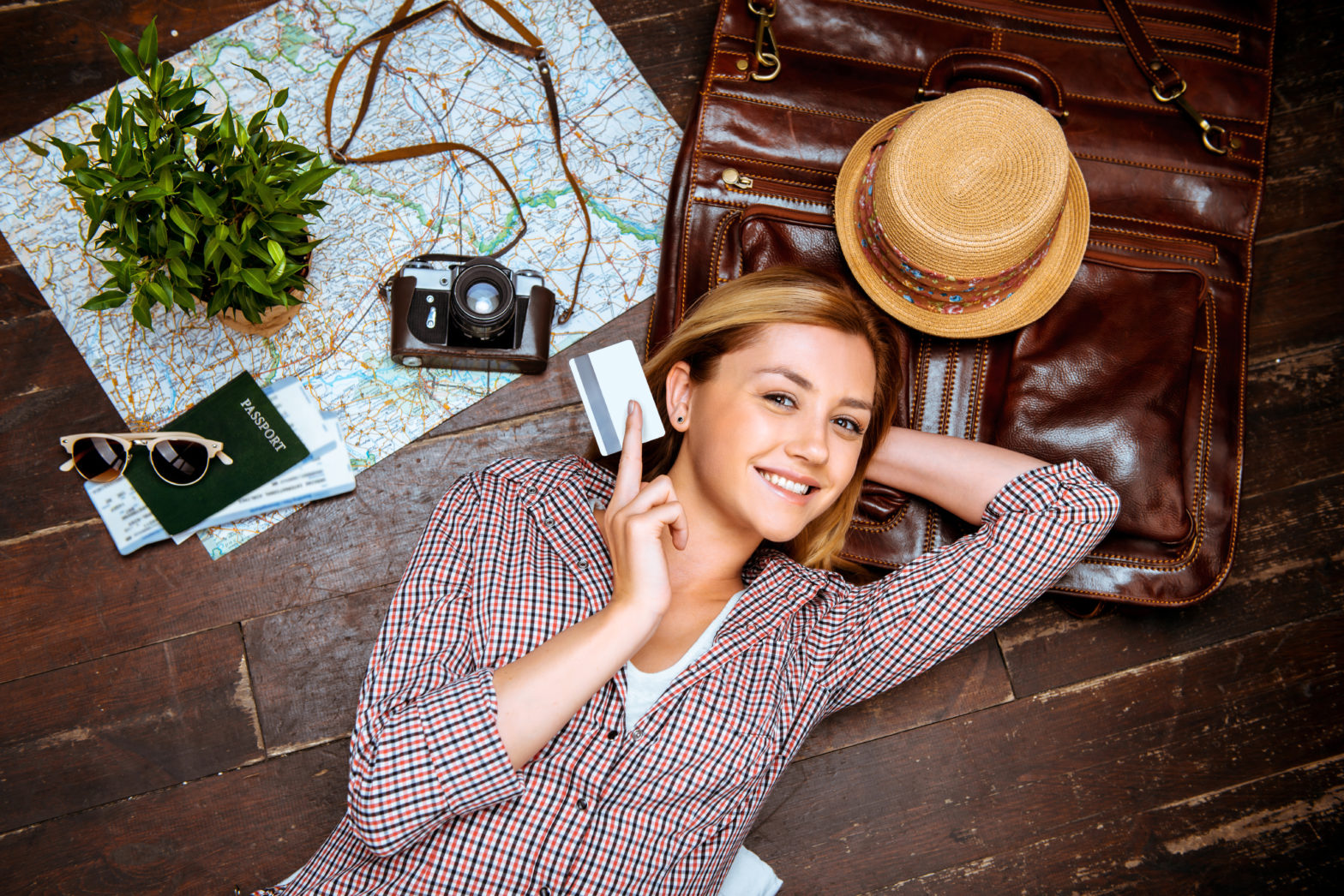 women travelling with her travel credit card