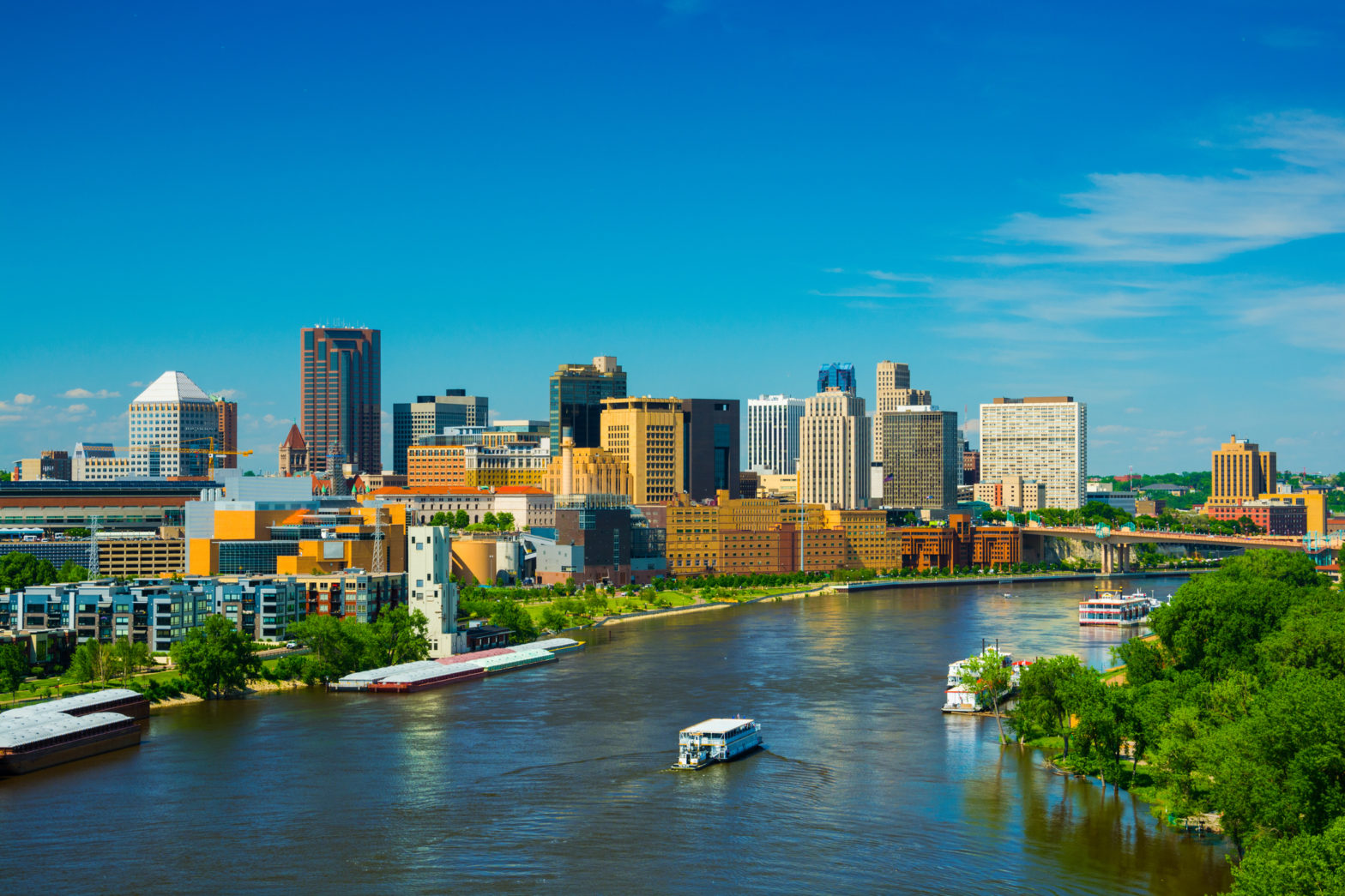 Saint Paul downtown skyline with the Mississippi River in the foreground. Saint Paul is part of the Minneapolis - Saint Paul Twin Cities area