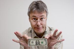 older-man-with-dollar-bill